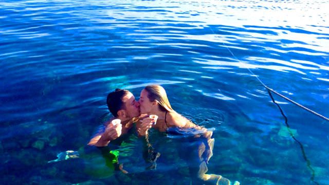Love birds cooling off while getting hot in the crystal blue waters on one of our Favignana vacations